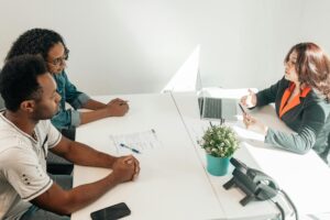 marketing consultant discussing strategies to client