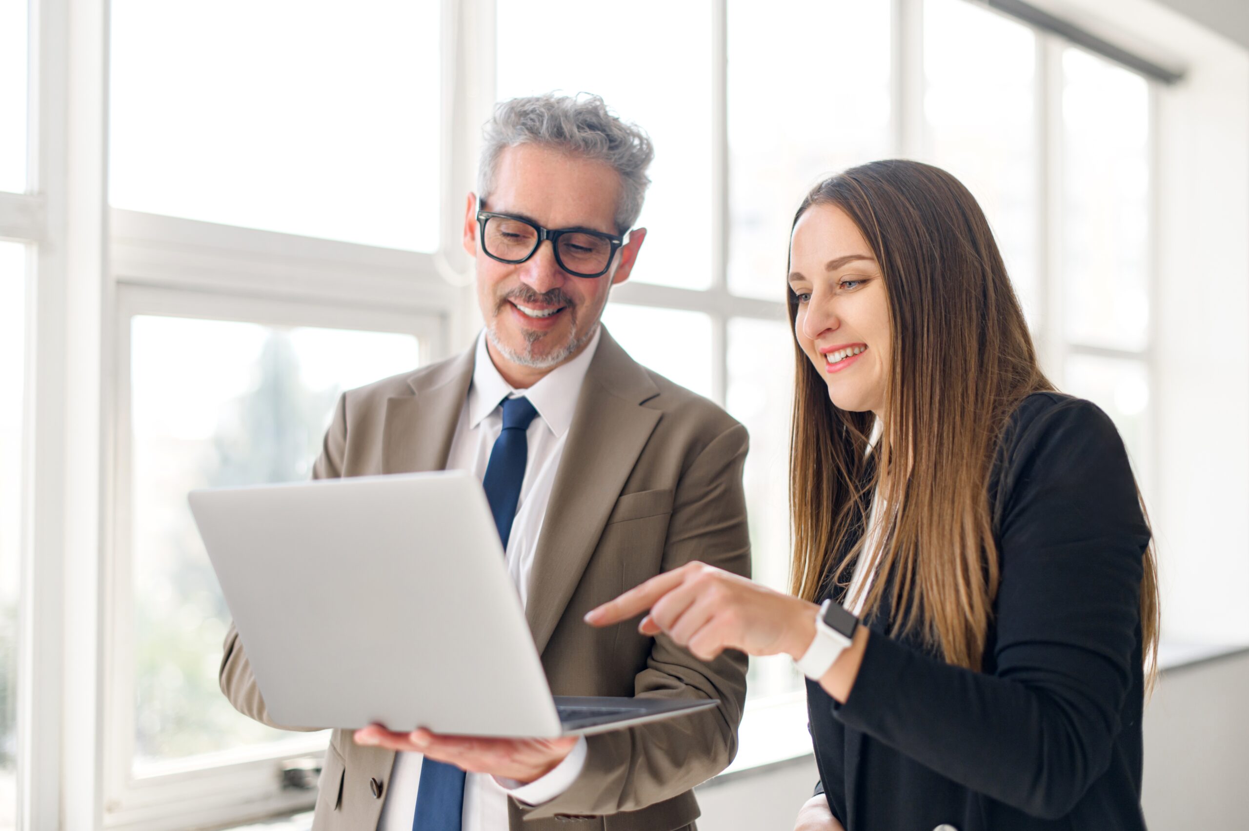 A new graduate with her mentor at their first marketing job